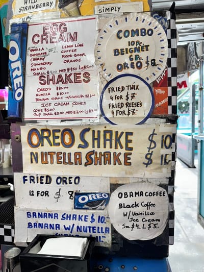 Handwritten menu signs by Ray in the East Village